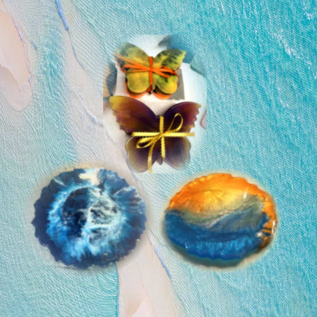 Colorful butterfly paper crafts on textured background, perfect for creative design projects.